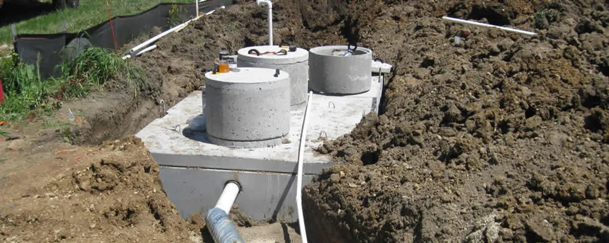 Septic system repair and installation site with tank access ports in Anaheim, CA